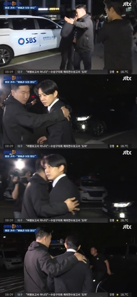 구속 면한 유아인, 시민 던진 커피병 맞고 ‘굳은 표정’