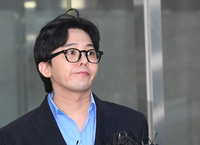 [포토]4시간에 걸친 조사를 마친 지드래곤