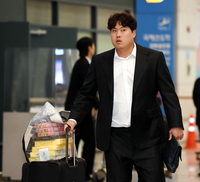 [포토] 류현진 ‘검게 그을린 얼굴로 귀국’