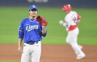 [포토] 김태훈 ‘홈런을 허용하고 말았어’