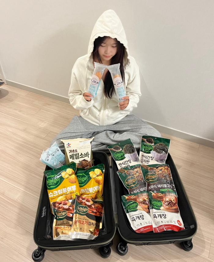 '스노보드 최연소 金' 최가온, 캐리어 속 'K푸드' 화제