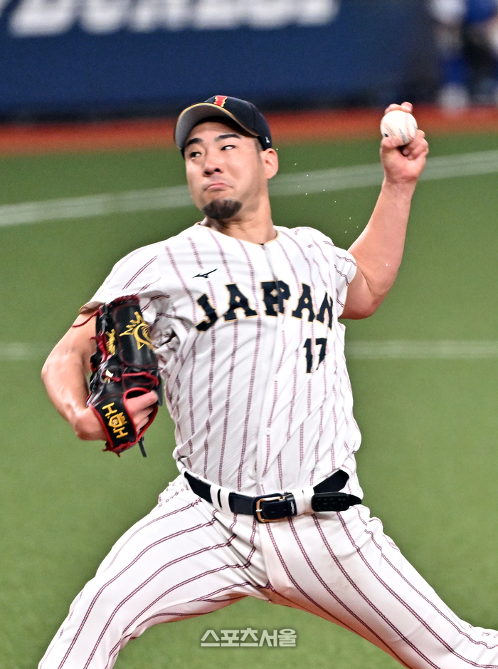 [포토]일본 대표팀 선발 기구치, 땀방울 흩날리며