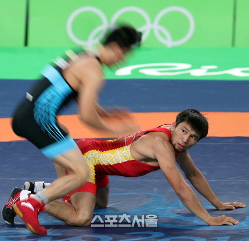 [SS포토]레슬링 중국 왕루민, \'파테르의 저억이다~\'