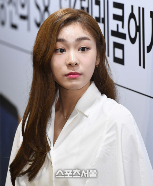 [SS포토] 피겨 스타 김연아, 플래시 세례에 눈이 휘둥그레~