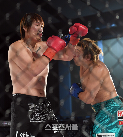 [포토]펀치 교환하는 최홍만