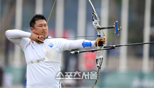 [포토] 양궁 오진혁 '단체전서 아쉬운 은메달'