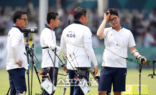 [포토] 양궁 김우진-이우석-오진혁, 대만에 아쉬운 패배 '은메달'