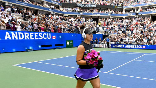 Photos: Andreescu walks in