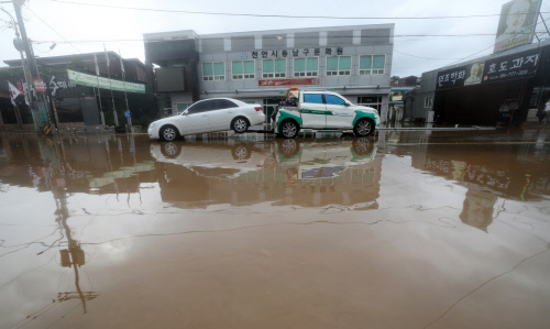 나흘 폭우 수도권 중부, 사망 12명 실종 14명 이재민 1천명 피해