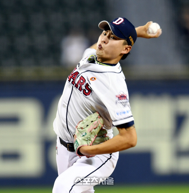 [나의 WBC⑦] 왼팔에 있던 태극기가 가슴으로 '신인왕' 정철원 "태극마크에 누가 되지 않겠다"